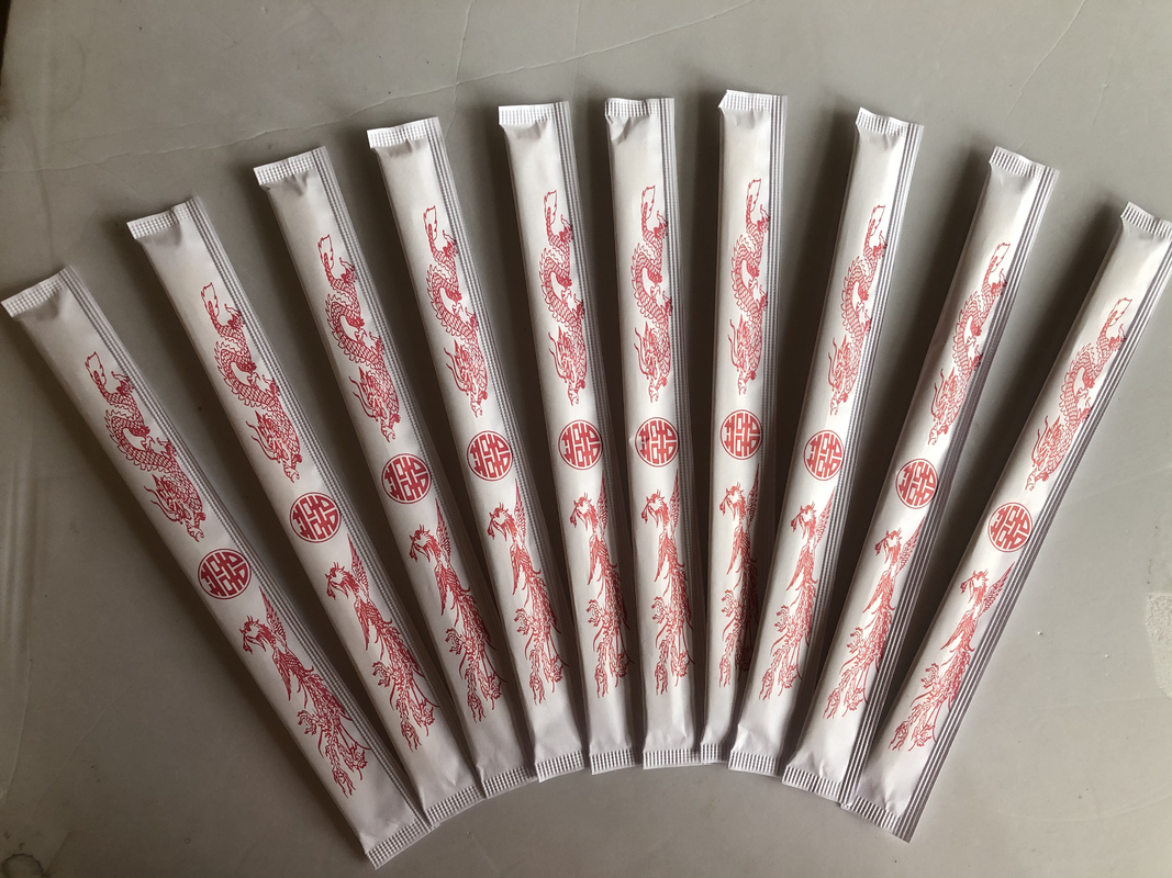 中国の食糧のために包まれる完全なペーパーが付いている21CM -24CM TENSOGE Dispossiableのタケ箸